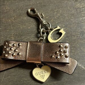 Guess Metallic Rose Gold Bow Purse Charm